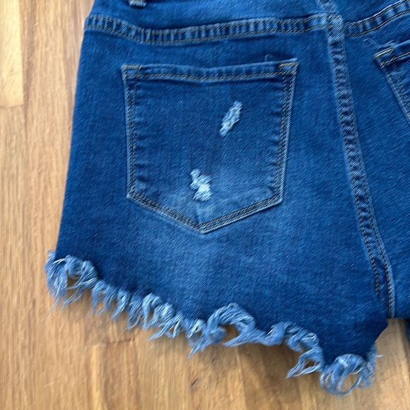 Women’s blue denim distressed jean shorts - Picture 7 of 16